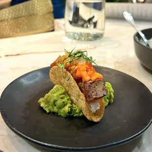 Did you know we have small plates for your after work hunger? This bite is our Tag Tuna Taco