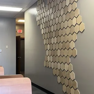 a wall with hexagons on it