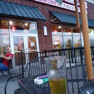 a glass of beer on a table