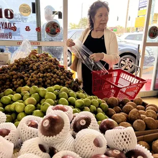 a woman shopping in a grocery store
