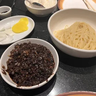 Black bean noodles with minced pork and veggies