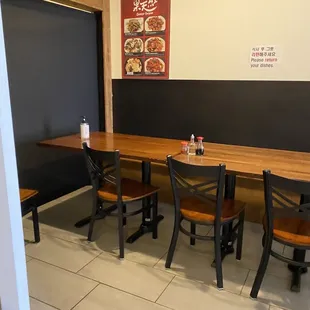 a table and chairs in a restaurant