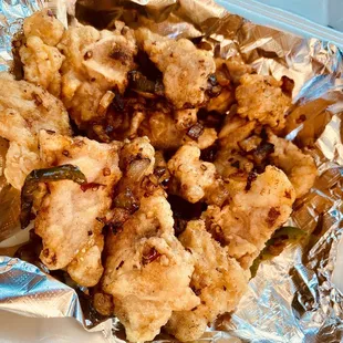 Crispy Pork Chop (perfectly seasoned with fried onions and green and red peppers) YOU NEED TO GET THIS !!