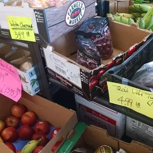 Boxes of fruit up front.