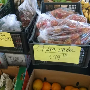 Fruit up near the front of the store. Rambutan!