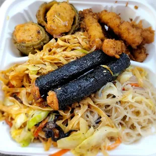 Half flat and vermicelli noodles. With stuffed bitter melon, imitation lemongrass chicken, and seaweed rolled imitation meat. So yum!