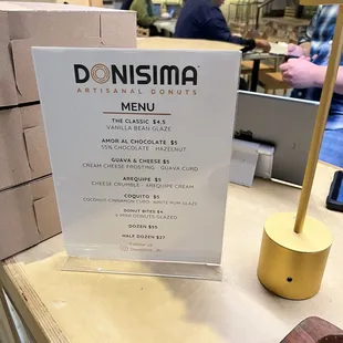 donuts on display at a donut shop