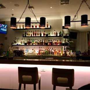 Bar area of restaurant at night, dinner service