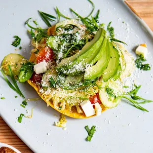 a plate of food on a wooden table