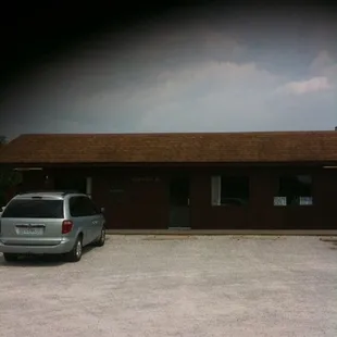 a car parked in front of a building