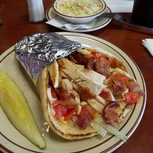 My pita club...  carved turkey, bacon, lettuce, tomato, swiss cheese added ranch..side Cole slaw...Messy delicious lol