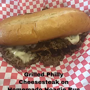 a pulled phil cheese steak on homemade hoagie bun