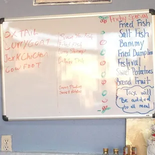 Daily menu listed on a board.