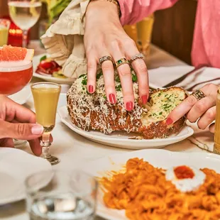 a table full of food and drinks