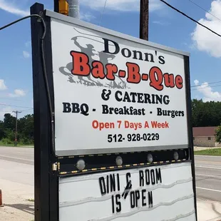 a sign for donn's bar bq