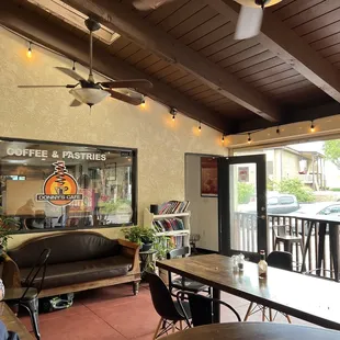 Outdoor seating area w/ ceiling fans