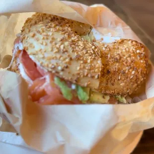 Smoked salmon on a garlic bagel.