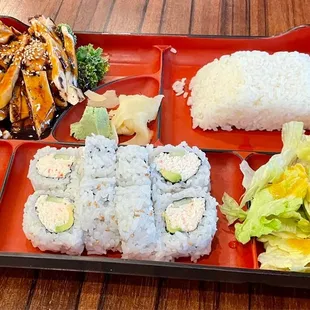 a bento box of sushi