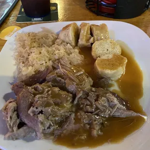 Roast pork, dumplings, and sauerkraut.