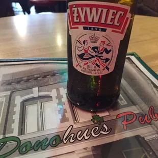 a bottle of beer on a table