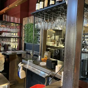 The wall of herbs from the center bar.