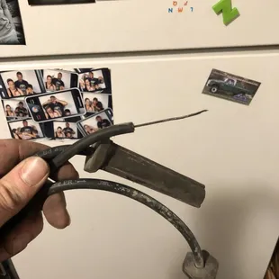 This is the spark plug wire that was so corroded onto the "new" spark plug that the wires came out of the boot