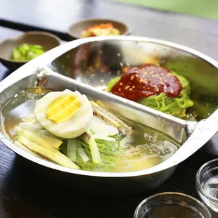 Now the first Korean restaurant in NYC to offer the half &amp; half bowl of COLD Nengmyun &amp; Bibim Nengmyun at Dons Bogam.