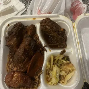 Brown stew chicken. (Plate untouched) small portion of cabbage and was missing my other side : (. Really good tho.