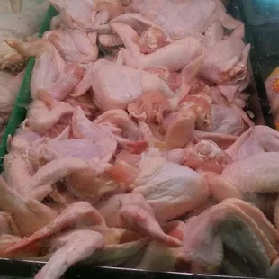 a display of raw chicken