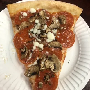 Pepperoni and mushroom. Nice crisp crust