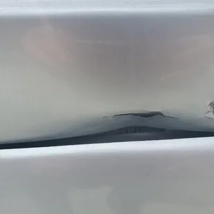 Damage to the lower driver door