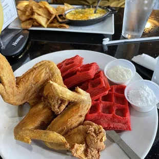 Red velvet waffles and chicken and collard greens dip