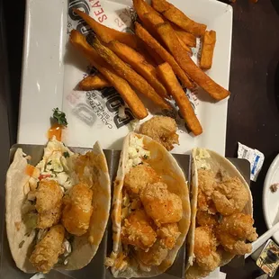 three tacoss and french fries