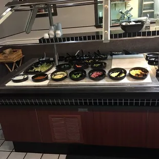 a buffet with a variety of foods