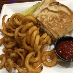 View of sandwich and Curley fries