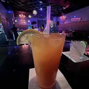 a drink with a slice of lemon