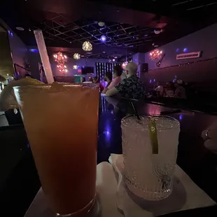 a cocktail and a drink