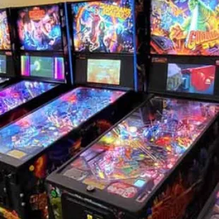 a row of pinball machines
