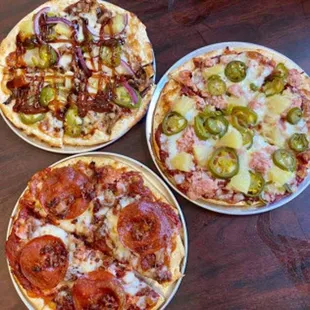 three different pizzas