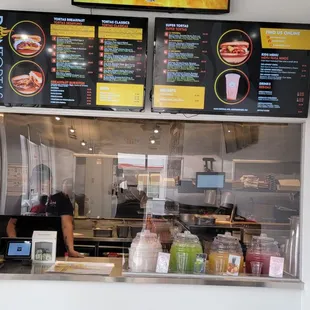 menus on the wall of a restaurant