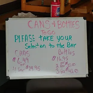 a sign that reads please take your seat in the bar