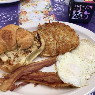 12-2018 - 4 item special bacon,eggs over medium (cooked perfectly) hash browns and a croissant.