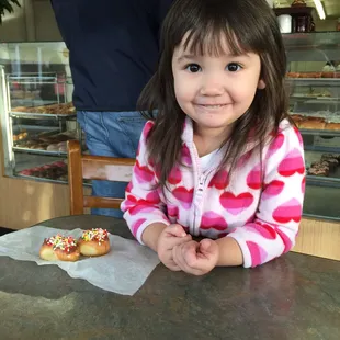 Complimentary sprinkled donut holes for the kid