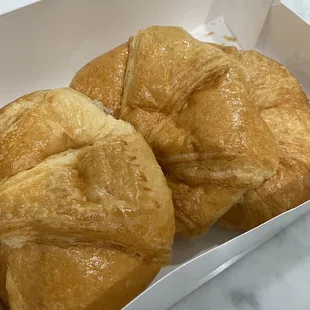two croissants in a box