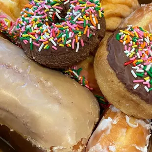 a variety of doughnuts in a box