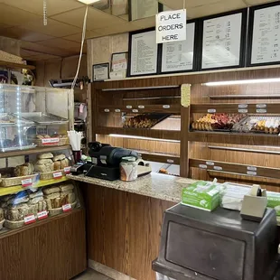 the counter of a donut shop