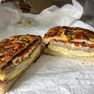 Everything bagel with Sausage, Bacon, Ham, Egg &amp; Cheese