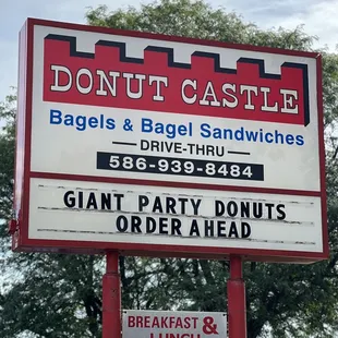 a sign for donuts and bagels