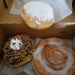 powdered Raspberry Bismark, Chocolate PB cream, and cinnamon roll