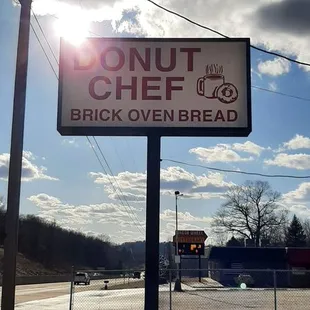a sign for donut chef